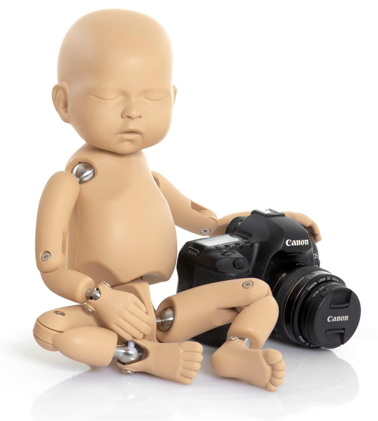 newborn photography posing doll